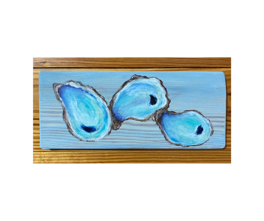 Oysters on Wooden Board